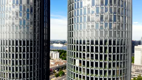 aerial shot of skyscrapers in riga, latvia, cityscape on the background. twin glass office buildings.