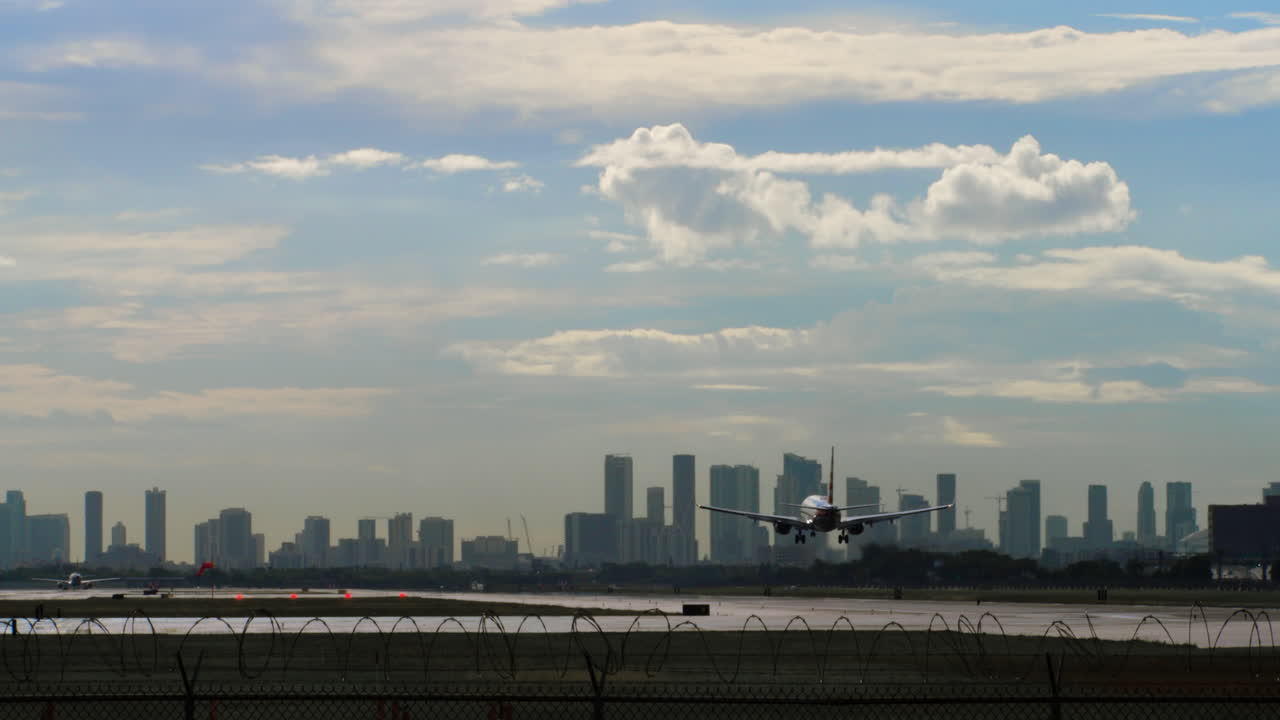 Commercial Airplane Landing Sequence with City Skyline