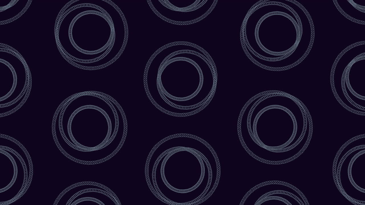 In the image, a captivating circular pattern in black and white is featured against a dark backdrop. The interconnected circles create a dynamic and visually appealing design