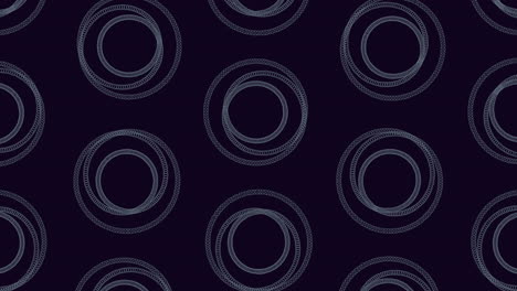 in the image, a captivating circular pattern in black and white is featured against a dark backdrop. the interconnected circles create a dynamic and visually appealing design