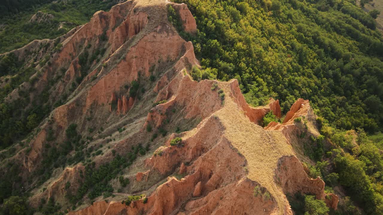 Drone flight over the sandstone peaks of the Stob Pyramids Bulgaria unique natural landmark with scenic countryside