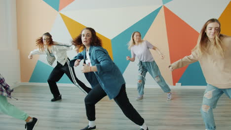 teenagers dancing in a dance studio