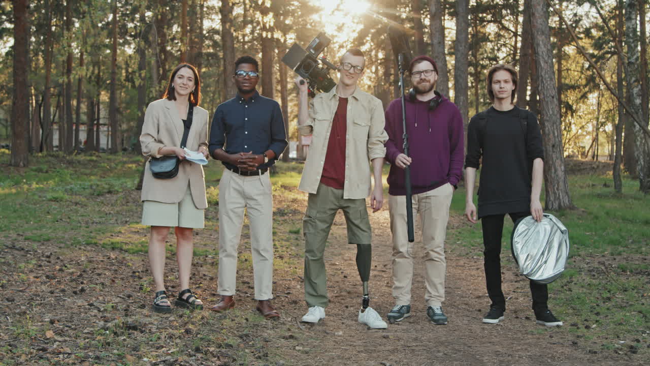 Full-Shot Portrait Of Filming Crew In Forest