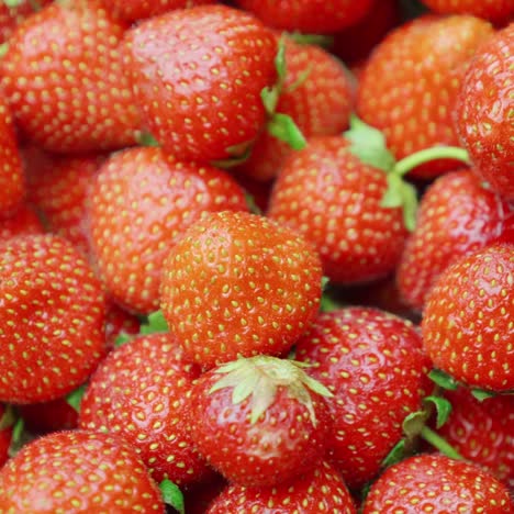 red juicy strawberries spinning