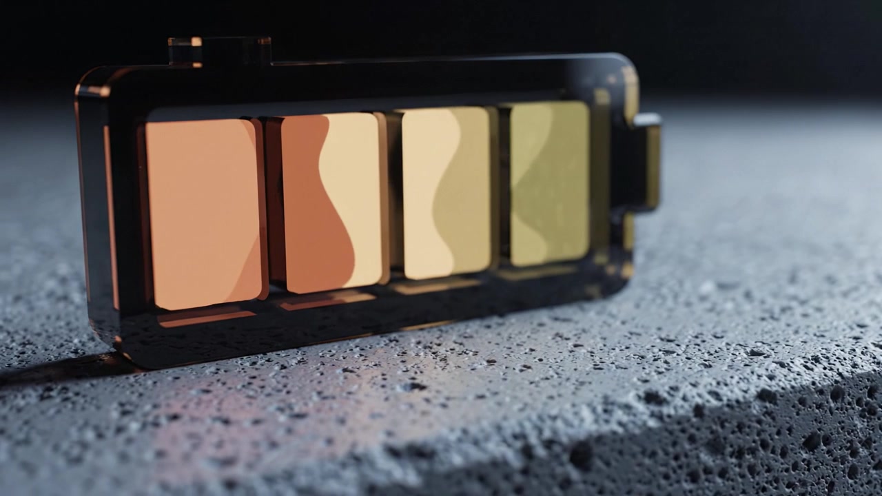 A Close-Up View of a Black Makeup Palette Showcasing Various Shades, Illuminated Against a Textured Background for a Modern Cosmetic Presentation