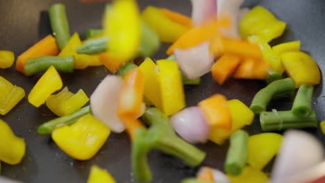 Vegetables-falling-into-a-non-stick-pan