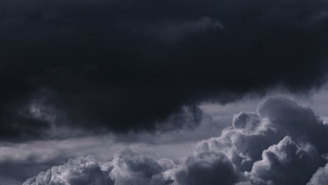 a thunderstorm in a dark cloud of gray, cumulus cloud