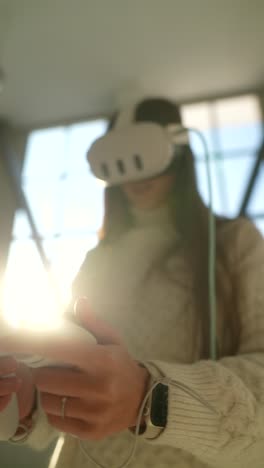 woman using vr headset and controllers