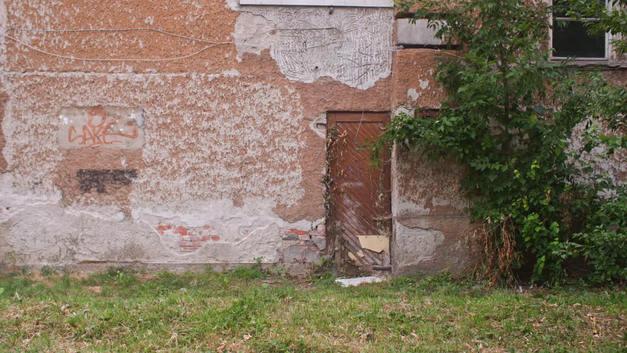 A neighborhood with communist architecture apartment buildings and the surrounding neighborhood environment, garden and grass from the communist era on the Balkans in Sofia, Bulgaria, Eastern Europe