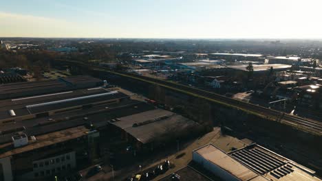 Aerial-hyperlapse-showing-buildings,-cars-and-city-landscape