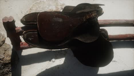 Rider-Leather-Saddle-on-fence-in-desert