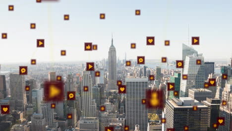 animation of network of digital icons against aerial view of cityscape