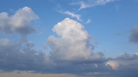 beautiful epic cloudscape time lapse of summer thunderstorm clouds forming in 4k. perfect as overlay, background of transition clip. only minor noise reduction in davinci or neat image needed.