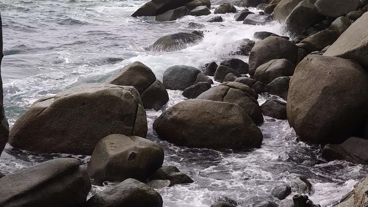 Ocean Waves Crashing Against Rocks on a Coastline