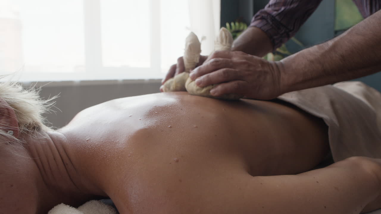 Relaxing Herbal Compress Back Massage