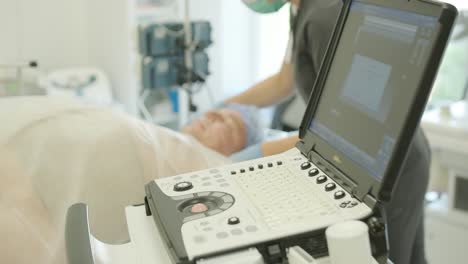 medical ultrasound exam on patient with leg ulcer