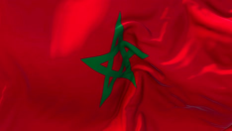 bandera de marruecos ondeando en el viento animación en cámara lenta. 4k textura de tela realista bandera soplando suavemente en un día de viento fondo de bucle continuo sin costuras.