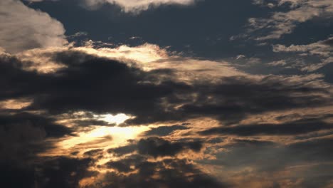 dark rolling clouds at sunset