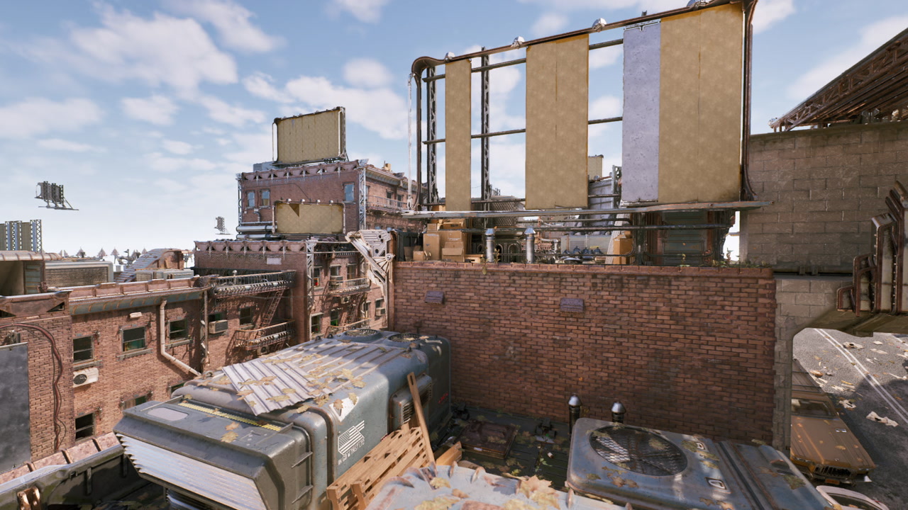 Abandoned vehicles on rooftop overlooking distant industrial horizon