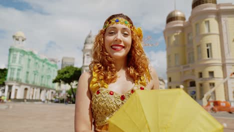 portrait of frevo dancer at the street carnival in recife, pernambuco, brazil.