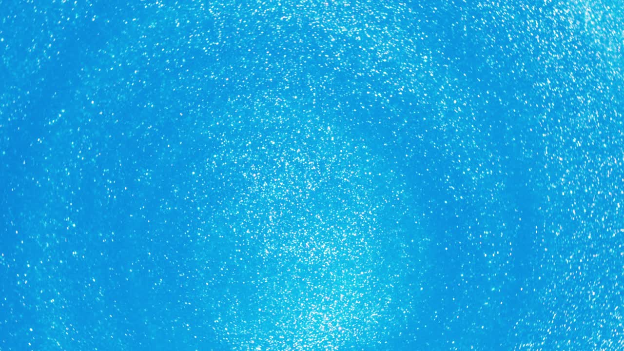 밝은 파란색 반이는 액체 회전