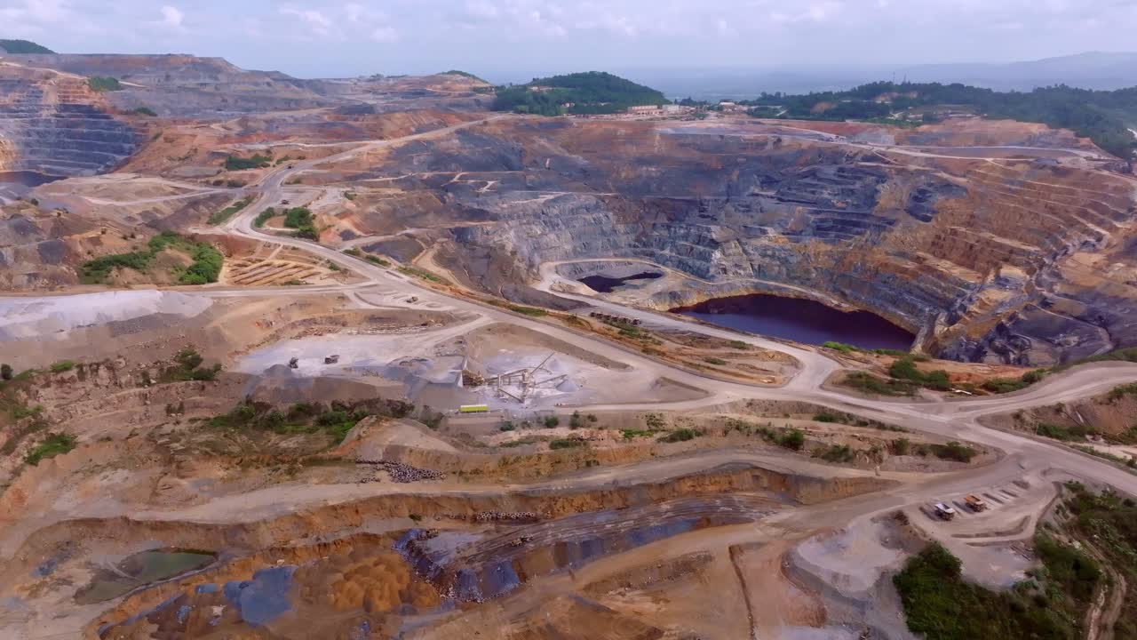 Large mining industry, gold and silver extraction, aerial establisher, open pit mine