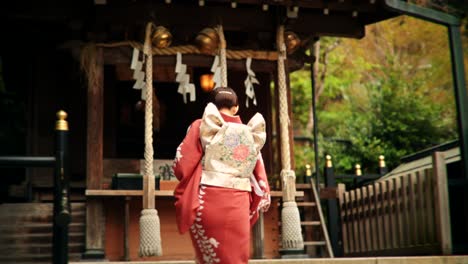 woman in kimono at a japanese shrine
