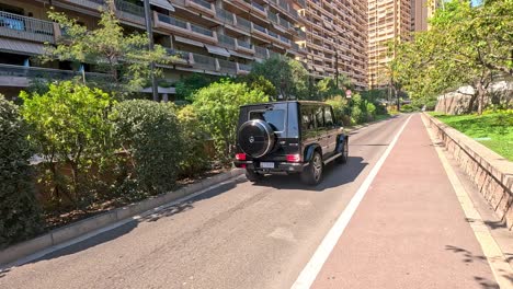Black car driving through Monte Carlo streets
