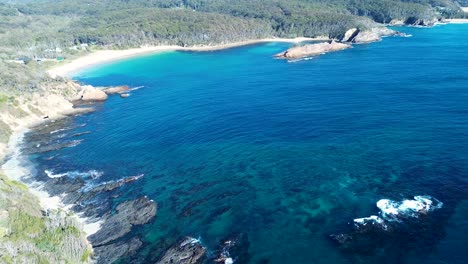 drone aerial bushland scenic shot beach swimming bay guerilla bay batemans bay nature travel tourism ocean floor headland coastline south coast nsw australia 4k