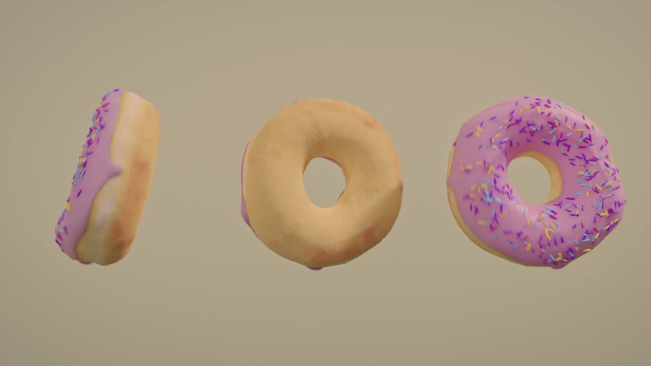 Pink glaze donuts on a yellow background