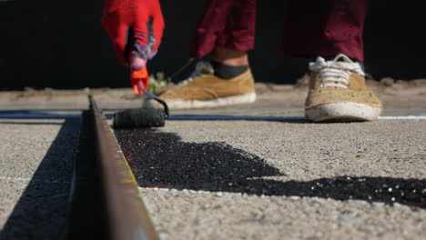 street artist painting on the floor - street painting - close up