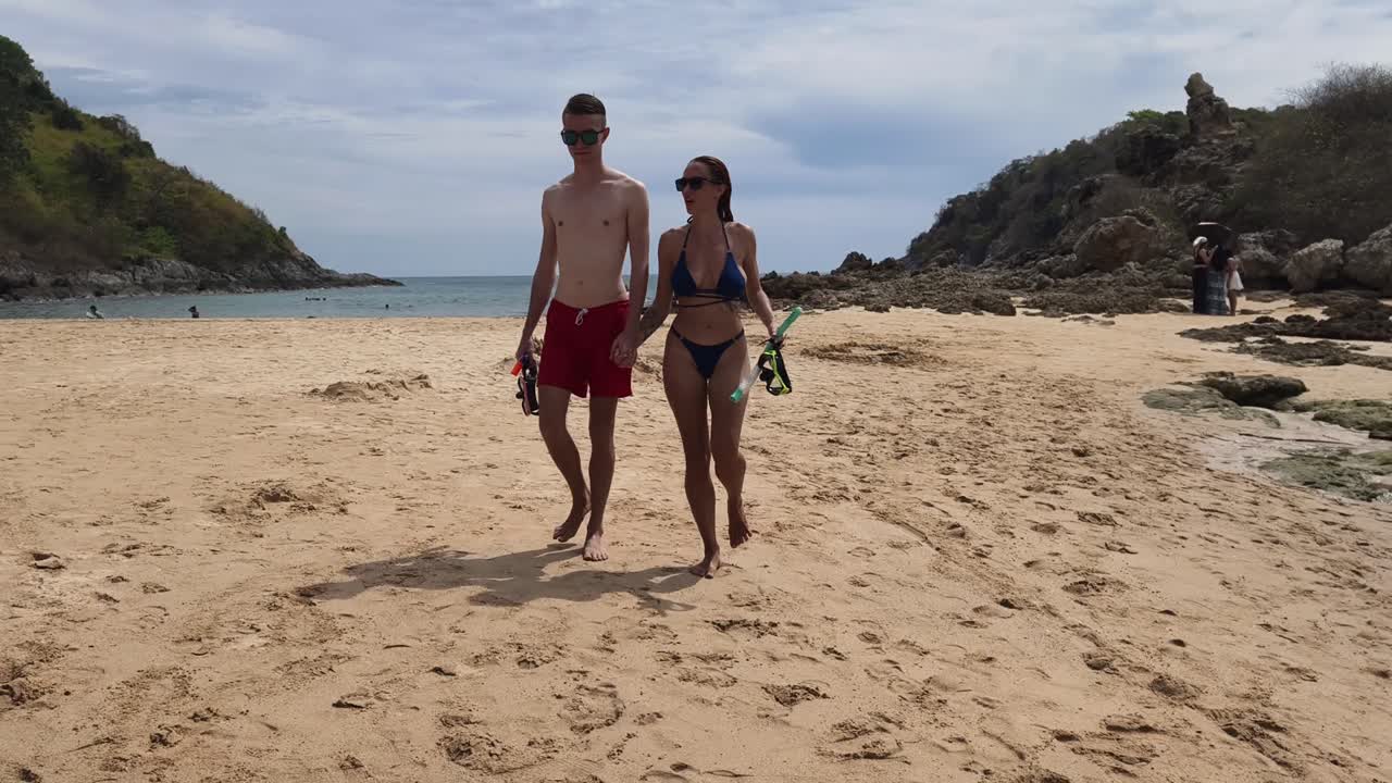 Couple Snorkeling on a Tropical Beach
