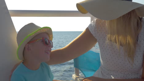 mother and son traveling by ship