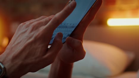 person using smartphone at night