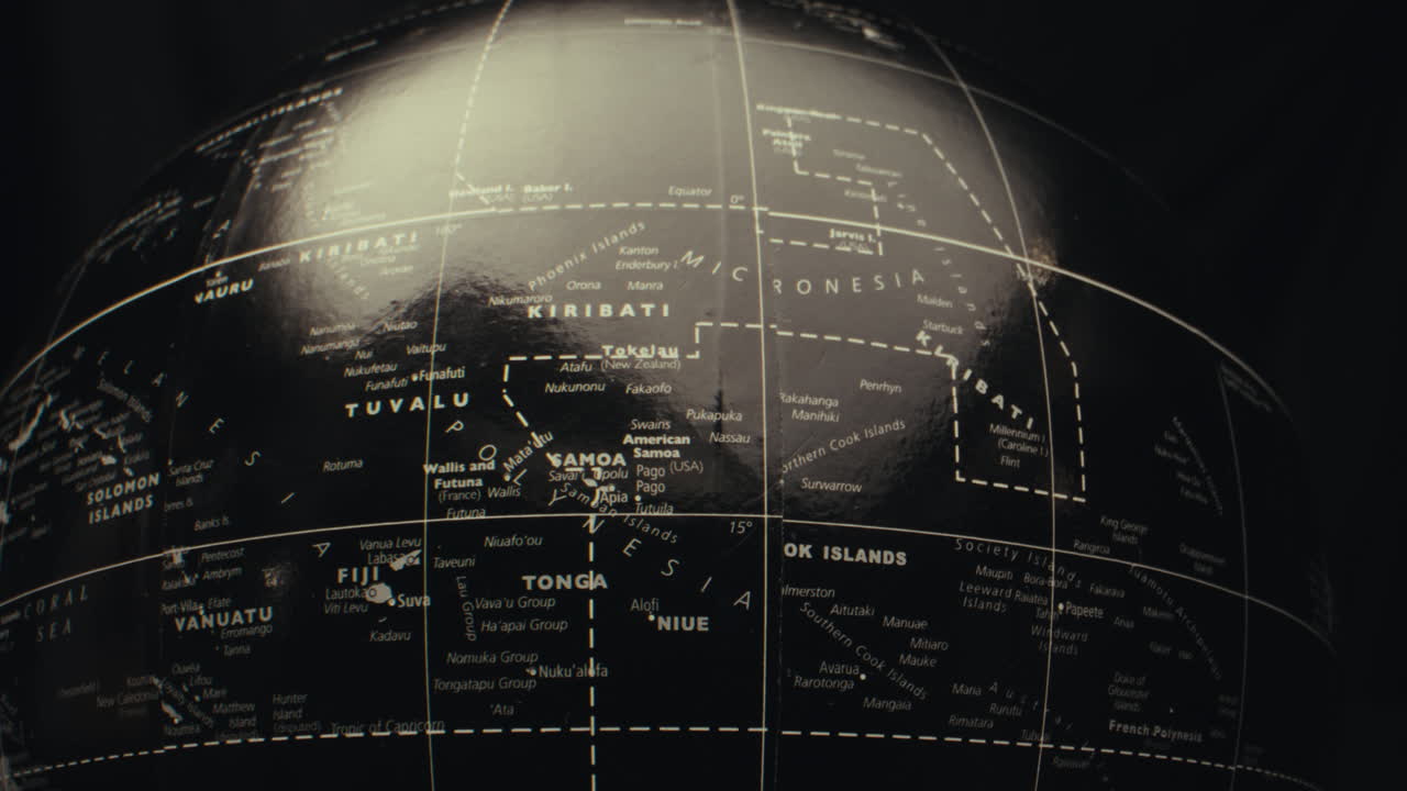Detailed Black Globe of Pacific Islands