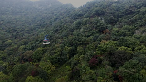korea, songnisan cable car, follow drone shot, shot away from cable car