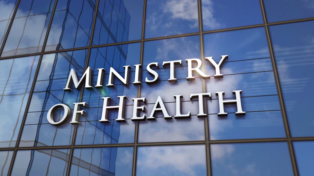 Ministry of Health building glass skyscraper with mirrored sky loop animation