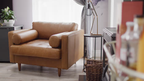 empty house interior of living room with armchair and lamp