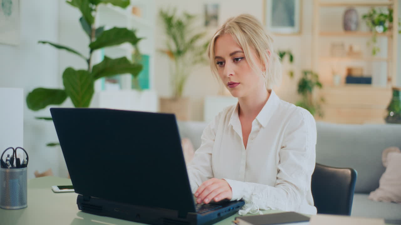 Businesswoman Working on Laptop