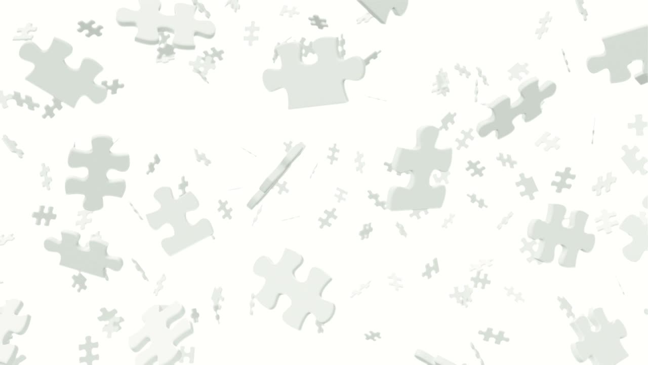 cientos de piezas del rompecabezas están volando delante de la cámara.