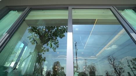 glass slide door with heat protection film, close up, no people