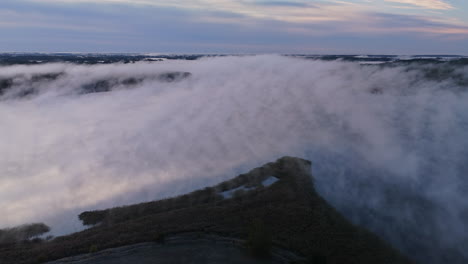 misty landscape over a lake