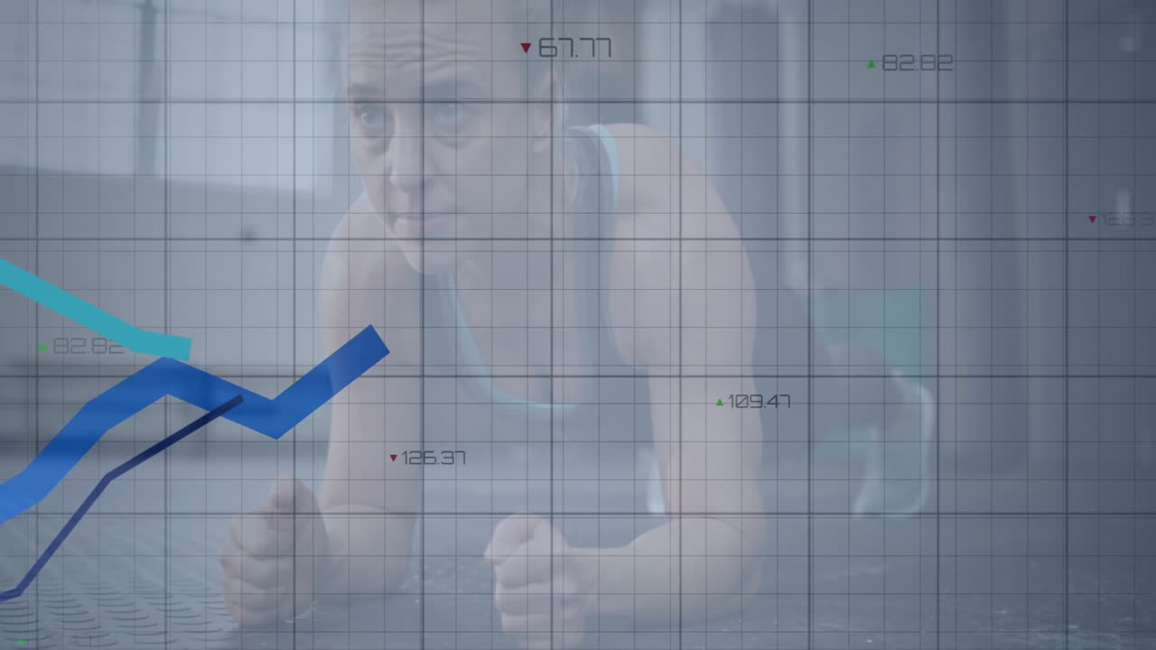 Woman holding forearm plank in fitness studio, displaying grid overlay with trend lines and data