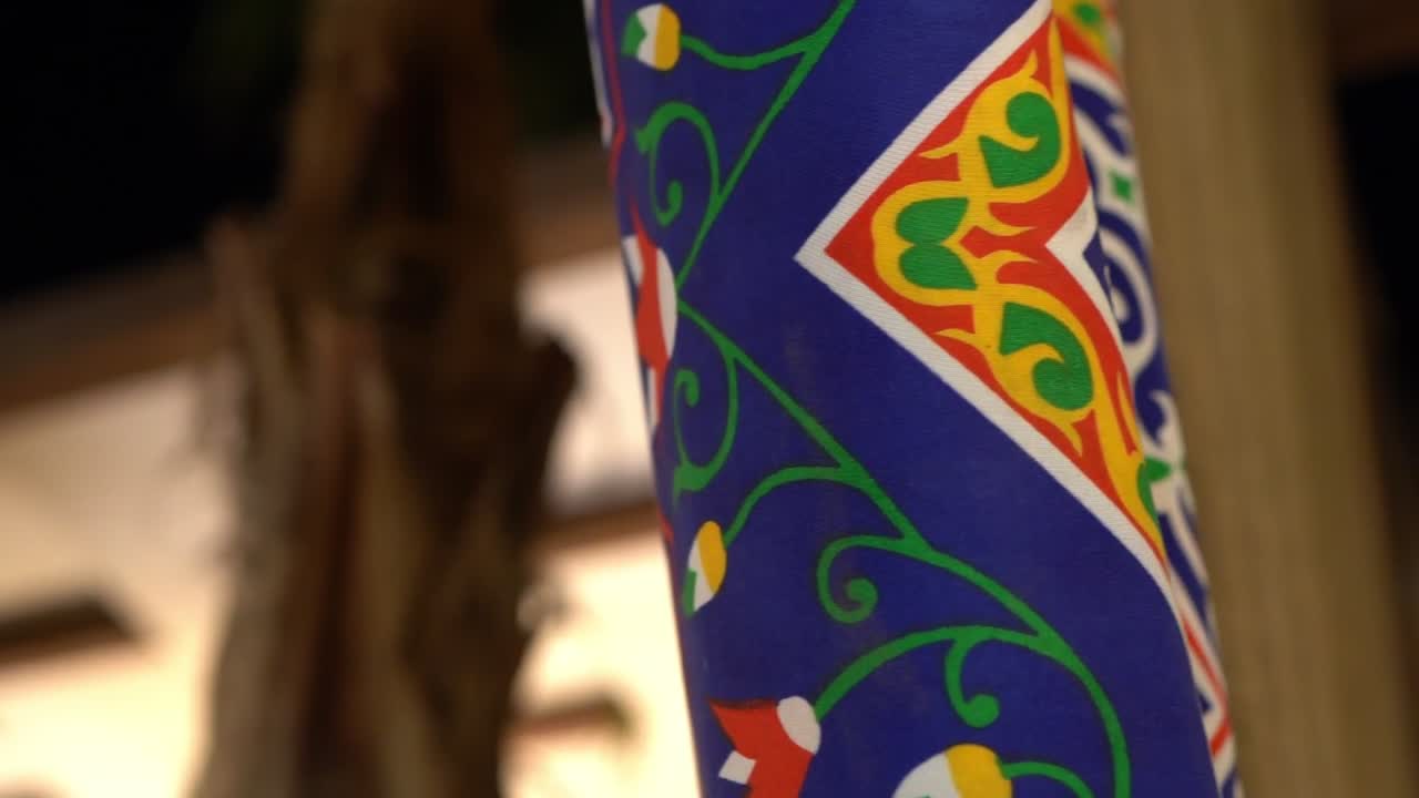 A colorful curtain with traditional Middle Eastern patterns, close up shot