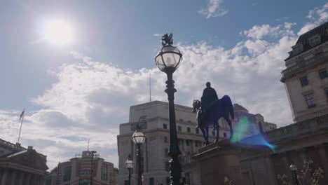 the back of the duke of wellington statue at the bank of england in london on a sunny day