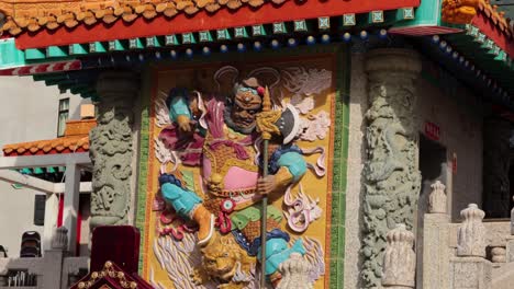 vibrant temple facade with intricate statues