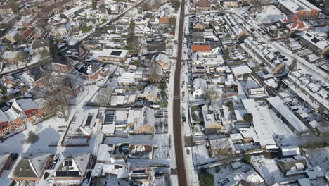 Aerial-of-beautiful-suburban-neighbourhood-in-winter