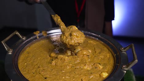 Close-up-of-paneer-butter-masala-in-an-Indian-buffet-restaurant