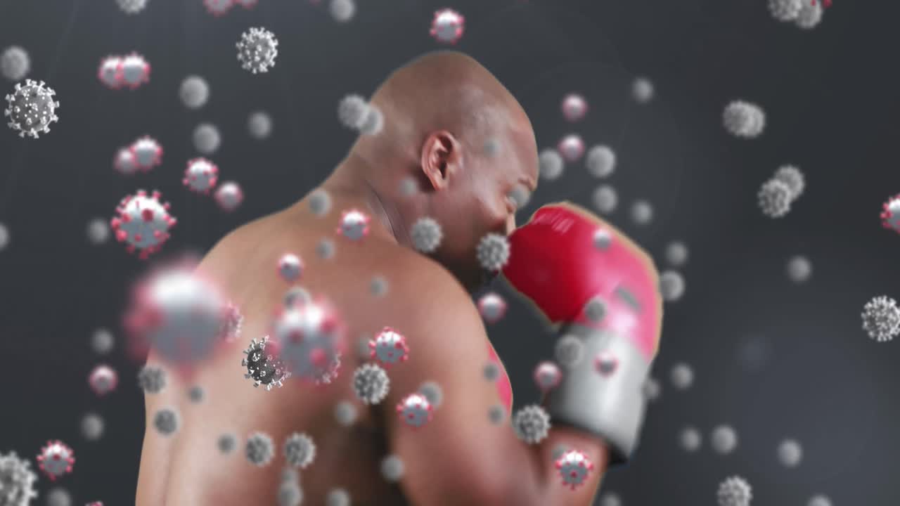 animación de células de virus flotando sobre el boxeo de un hombre afroamericano