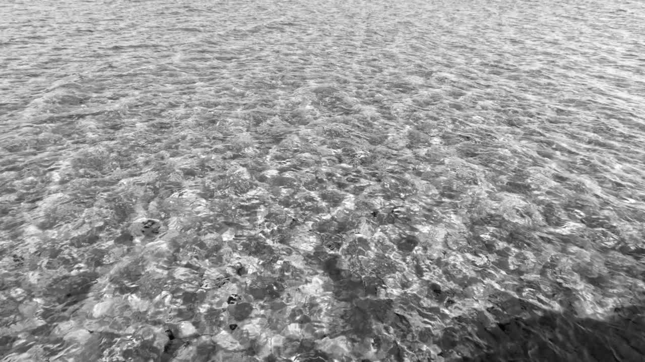 Gentle waves moving over a textured surface